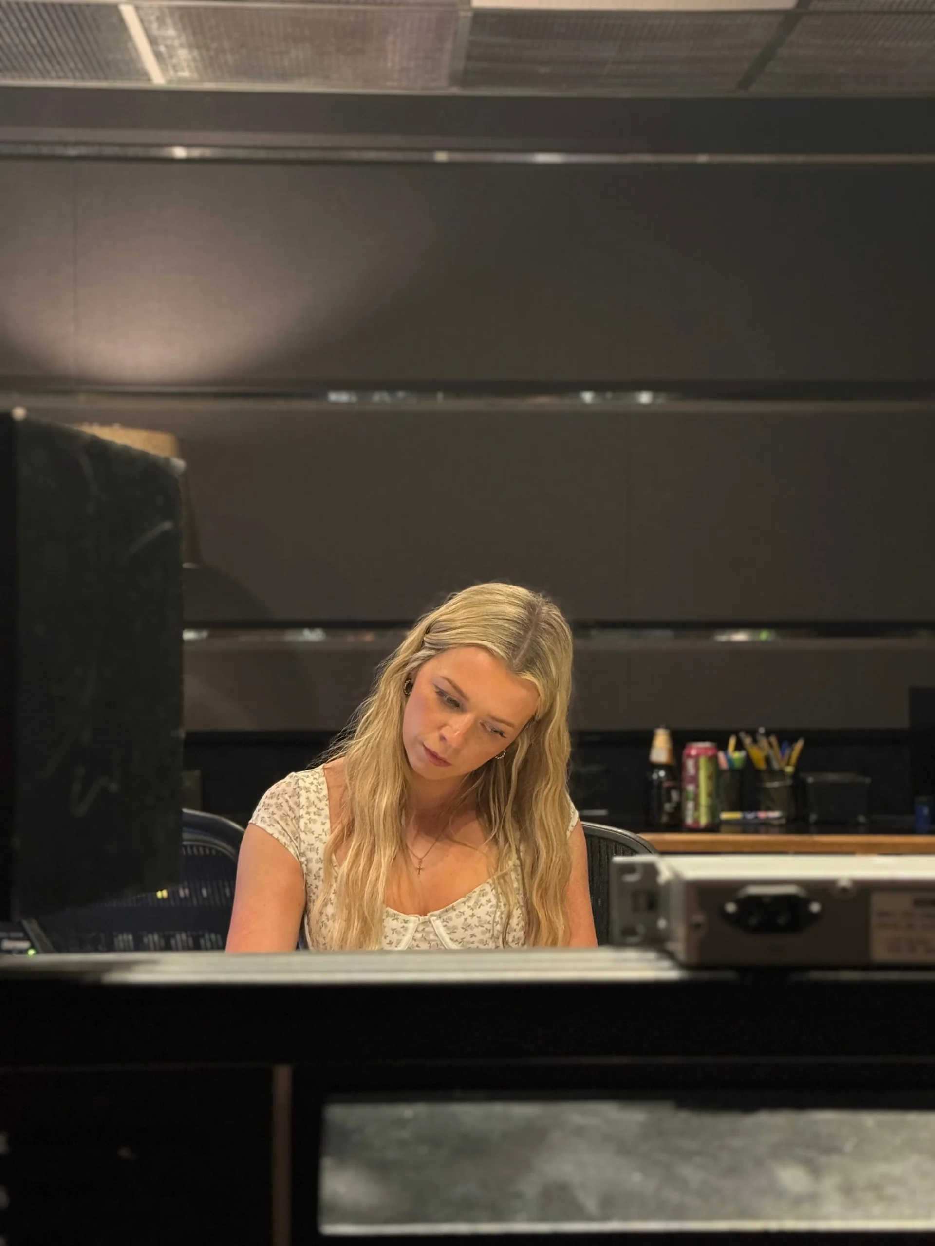 Emily Nelson working in the recording studio